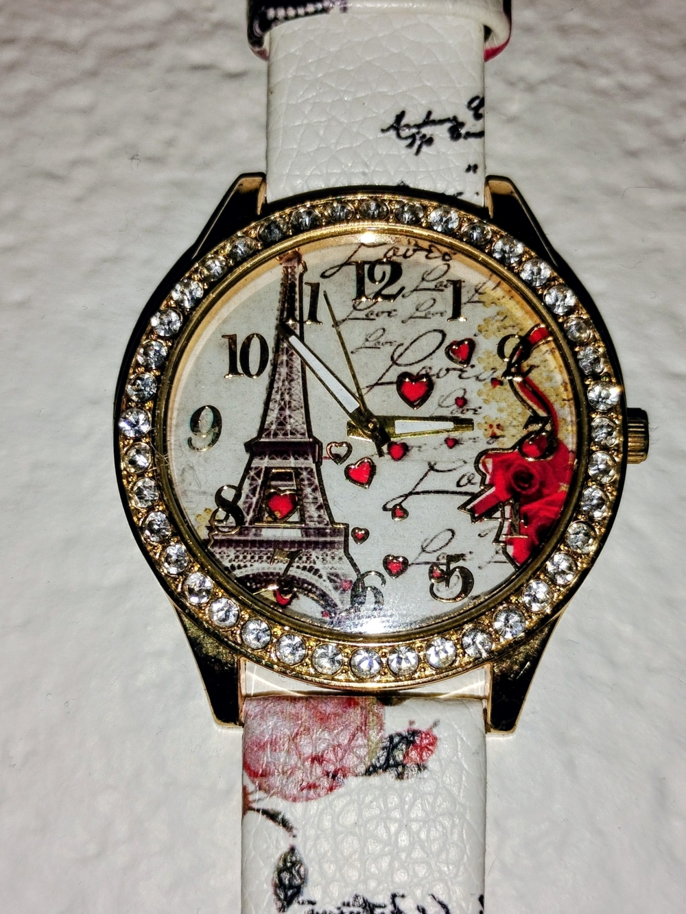 Gold-Tone Paris Eiffel Crystal Accent Watch - White Strap (Watch Needs Battery) - Picture 2 of 3